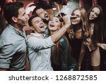 Holidays Concept. Dancing People. Great Mood. Young People. Dance Club. Sing. Microphone. Trendy Modern Nightclub. Party Maker. Birthday. Karaoke Club. Celebration. Men. White Shirt.