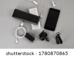 Mobile accessories include white and black power bank, wireless headphone adapter and smartwatch and type C cable