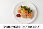 Gefilte fish with carrot. Plate of traditional Passover Pesach gefilte fish on table