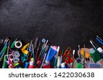 school supplies on blackboard... | Shutterstock . vector #1422030638