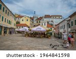 Small photo of Herceg Novi, Montenegro - 08.08.2019: One of the sunniest towns on the coast. Big Tourist attraction. Main squares in Herceg Novi. Good place for a coffee break and rest. Multicultural atmosphere.