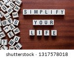 Small photo of Text sign showing Simplify Your Life. Conceptual photo Manage your day work Take the easy way