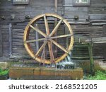 Old Wooden Wheel From A Mill On ...