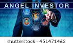 Small photo of Male entrepreneur is pushing ANGEL INVESTOR on an interactive touch screen. Start up finance concept for business angel, informal investor, angel funder or seed investor, especially the tech sector.