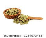 pumpkin seeds isolated on white ... | Shutterstock . vector #1254073465