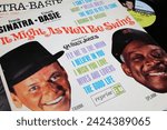 Small photo of Viersen, Germany - January 9. 2024: Frank Sinatra and Count Basie vinyl record album cover It might as well be swing arranged by Quincy Jones 1964 (focus on center)