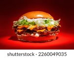 smash burger salad in red background