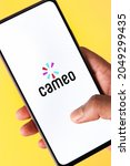 Small photo of West Bangal, India - August 21, 2021 : Cameo logo on phone screen stock image.