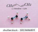 Small photo of Structural chemical formula and molecular structure model of 1,3 - butadiene molecule. It is the simplest conjugated diene, important industrially as a monomer in the production of synthetic rubber.