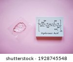 Small photo of Structural chemical formula of hyaluronic acid macromolecule with liquid hyaluronic acid gel or serum. Hyaluronic acid has a key role in tissue regeneration.