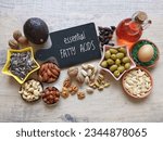 Small photo of Food high in linoleic acid. Natural food sources of omega 6 and omega 3 essential fatty acids. Good fats - nuts, seeds, oils, vegetable; concept of healthy and balanced diet.