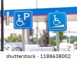 Parking for disabled guests label in gas station.