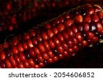 Close up of a red corn on the...