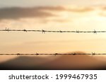 Barbed Wire Fence With Twilight ...