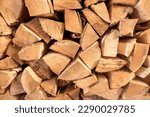 Small photo of Log spruce trunks pile. Sawn trees from the forest. Logging timber wood industry. Cut trees along a road prepared for removal. High quality photo