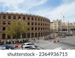Small photo of VALENCIA, SPAIN - SEPTEMBER 21, 2023: Street scene of the Valencia BullRing and the Valencia Train Station. In 2022, 2.2 million tourists visited Valencia, Spain.