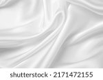 Small photo of Smooth elegant white silk or satin luxury cloth texture can use as wedding background. Luxurious background design.