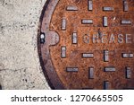 Rusty Metal Grease Trap Cover...