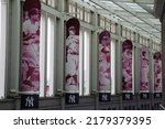 Small photo of Bronx, New York, USA - June 12, 2022: Banners of famous New York Yankees displayed in the interior concourse of Yankee Stadium