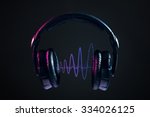 Dj Headphones and disco waves isolated on black background