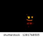 grinning haloween pumpkin in... | Shutterstock . vector #1281768505