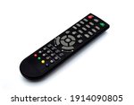 A black TV remote control isolated on a white background