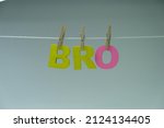 Small photo of Word 'Bro' on white background. A Bro is a person who will bend over backwards to help you bend someone over backwards.