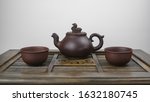 An Ancient Teapot And Two Clay...