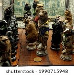 Small photo of NORTHAMPTON, UNITED KINGDOM - Apr 20, 2021: Reynard The Fox Black White Animal Figurine Grand Collector Chess Set