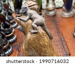 Small photo of NORTHAMPTON, UNITED KINGDOM - Apr 20, 2021: Reynard The Fox Black White Animal Figurine Grand Collector Chess Set