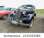 Small photo of MO, ARGENTINA - Mar 27, 2022: Moron, Argentina - Mar 26, 2022 - old black Chevrolet Chevy Master Deluxe coupe with rumble seat 1938 by GM CADEAA 2022 at MNA classic car show