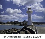 A White Lighthouse At The...