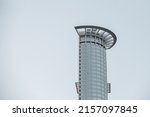 Small photo of A vertical shot of Westend Tower the headquarters of DZ Bank against cloudy sky in Frankfurt am Main, Hesse, Germany