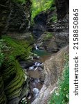 Small photo of A vertical shot of a creek at Watkins Glen State Park, Finger Lake region, upstate New York, USA