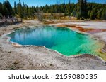A closeup of the colorful West Thumb Geyser in the Yellowstone National Park in the US