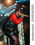 Small photo of MIAMI, UNITED STATES - Dec 20, 2021: A vertical shot of rapper Anuel performing at a festival in Miami, United States