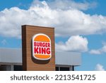 Small photo of SINES, PORTUGAL - May 04, 2022: The logo of Burger King fast food chain on the wooden board outdoors