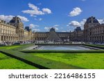 Small photo of PARIS, FRANCE - Sep 24, 2019: A scenic view of the Louvre Museum at the heart of Paris, France in daylight