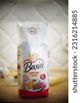 Small photo of POZNAN, PL - Oct 17, 2022: A closeup shot of Polish Basia brand white flour in an open bag