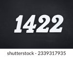 Black for the background. The number 1422 is made of white painted wood.