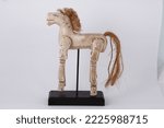 Small photo of Wood horse with moveable joints on display stand