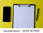 top view of blank paper on... | Shutterstock . vector #2053767905