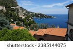 Small photo of A beautiful view between Cap d'Ail and Villefranche-sur-Mer in the departement Alpes-Maritimes in the region Provence-Alpes-Cote d’Azur in France, in the month of June