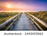 Wooden Pier At Sunset Along The ...