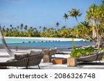 Small photo of Fari Islands, Maldives - November 5 2021: The Veli Bar swimming pool lounge at the new Patina Maldives Fari Islands luxury resort.