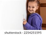 Small photo of Turn off the Lights, Saving Energy and Reducing Energy Consumption of the World. Kid Girl Switching off Light. Copy Space.