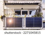 Small photo of Solar Panel of Modern Apartment Building Balcony in City with Sun light Reflection. Small Local Solar Panel system for Eco Flat.