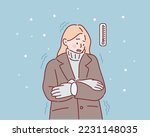 woman shivering from cold...