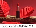Red Lipstick On Wooden Podium...