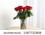 Vase With Bouquet Of Red Roses...